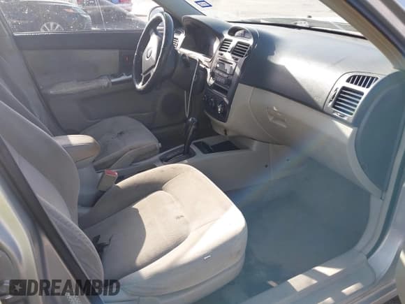 ✅ 2005 Kia Spectra LX • VIN: KNAFE121955143141 • Lot: 42767872. Listed on IAAI with 178,724 mi. Free auction sales archive from the USA and detailed vehicle history report at DreamBid. Image 5.