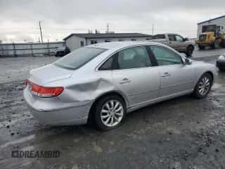 2007 Hyundai Azera SE z VIN KMHFC46F47A202070, wystawiony jako Copart lot #80811434 z przebiegiem 98 692 mil mil oraz Szkoda całkowita • Salvage title. Historia ofert i sprzedaży dostępna na DreamBid. Obrazek 3.