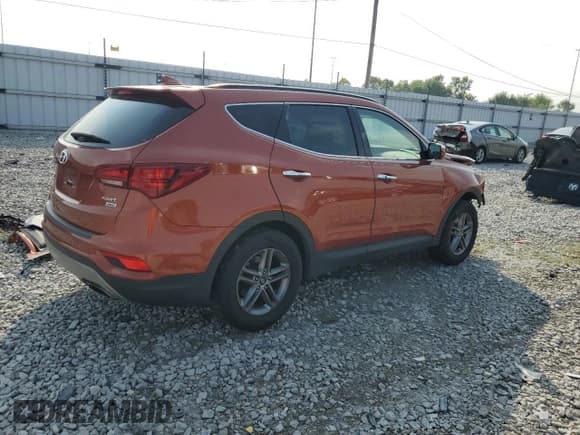 ✅ 2017 Hyundai Santa Fe 2.4L • VIN: 5XYZUDLB2HG433633 • Лот: 64371173. Опубликован ранее на Copart с пробегом 84 811 миль. Бесплатный доступ к архиву аукционных продаж из США и подробный отчёт об истории автомобиля на DreamBid. Изображение 3.