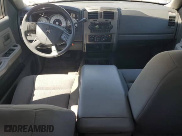 2006 Dodge Dakota SLT с VIN 1D7HE48K66S702859, выставлен на аукционе Copart как лот 57769865 с пробегом 179 847 миль миль и Списание • Salvage title. История ставок и продаж доступна на DreamBid. Изображение 8.