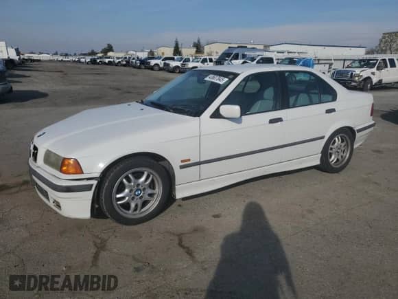 1998 BMW 3 Series 328i with VIN WBACD4324WAV61646, listed as a Copart auction lot 43607845 with 253,609 mi miles and Salvage title. Bid and sale history available at DreamBid. Image 1.