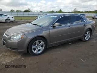 ✅ 2012 Chevrolet Malibu 1LS • VIN: 1G1ZB5E07CF185195 • Lot: 79741894. Listed on Copart with 126,140 mi. Free auction sales archive from the USA and detailed vehicle history report at DreamBid. Image 1.