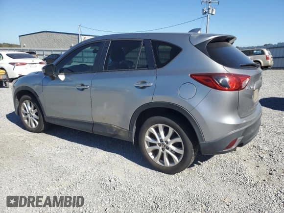 ✅ 2014 Mazda CX-5 Grand Touring • VIN: JM3KE2DY3E0365910 • Lot: 82513865. Listed on Copart with 122,834 mi. Free auction sales archive from the USA and detailed vehicle history report at DreamBid. Image 2.