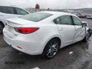 ✅ 2014 Mazda 6 i Grand Touring • VIN: JM1GJ1W67E1118643 • Lot: 43604649. Listed on IAAI with 147,515 mi. Free auction sales archive from the USA and detailed vehicle history report at DreamBid. Image 4.