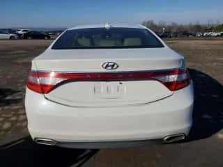 2015 Hyundai Azera с VIN KMHFG4JG7FA442796, выставлен на аукционе Copart как лот 45759345 с пробегом 129 040 миль миль и Списание • Salvage title. История ставок и продаж доступна на DreamBid. Изображение 6.