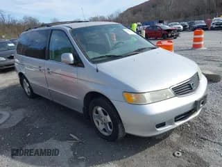 ✅ 2001 Honda Odyssey EX • VIN: 2HKRL18611H601564 • Lot: 43683828. Listed on IAAI with 184,613 mi. Free auction sales archive from the USA and detailed vehicle history report at DreamBid. Image 1.