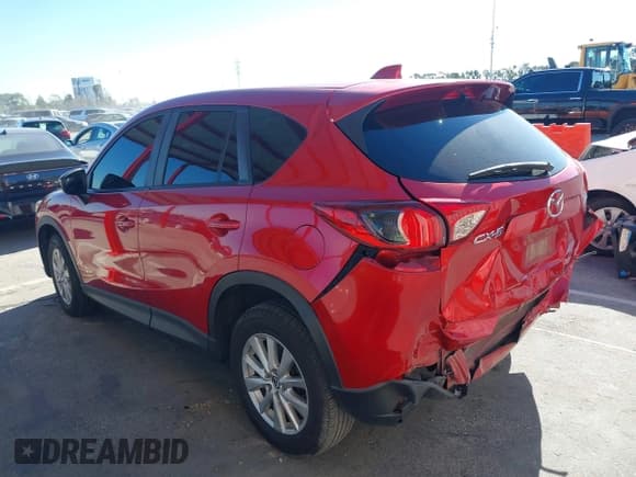 ✅ 2015 Mazda CX-5 Sport • VIN: JM3KE2BE6F0500131 • Lot: 43784489. Listed on IAAI with 149,701 mi. Free auction sales archive from the USA and detailed vehicle history report at DreamBid. Image 3.