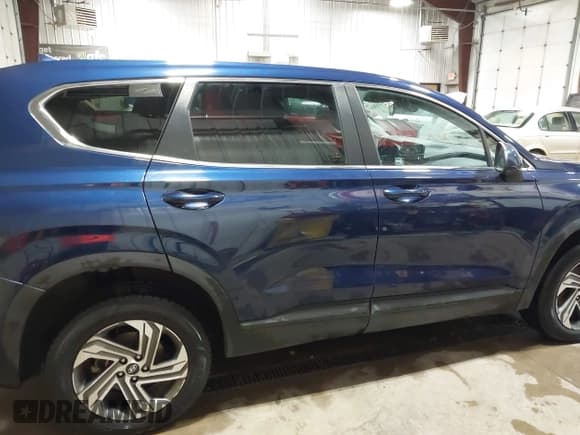 ✅ 2021 Hyundai Santa Fe SE • VIN: 5NMS1DAJ4MH318715 • Lot: 43266561. Listed on IAAI with 86,772 mi. Free auction sales archive from the USA and detailed vehicle history report at DreamBid. Image 13.