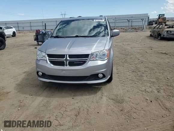 2018 Dodge Grand Caravan SXT z VIN 2C4RDGCGXJR224672, wystawiony jako Copart lot #82143145 z przebiegiem 104 991 mil mil oraz Szkoda całkowita • Salvage title. Historia ofert i sprzedaży dostępna na DreamBid. Obrazek 14.