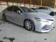 2021 Toyota Camry Hybrid LE with VIN 4T1C31AK5MU554381, listed as a Copart auction lot 69998775 with 104,313 mi miles and Salvage title. Bid and sale history available at DreamBid. Image 4.