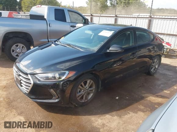 ✅ 2018 Hyundai Elantra SEL • VIN: 5NPD84LFXJH286297 • Lot: 43365575. Listed on IAAI with 77,201 mi. Free auction sales archive from the USA and detailed vehicle history report at DreamBid. Image 2.