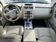 ✅ 2009 Mercury Mariner Premier • VIN: 4M2CU97G19KJ01228 • Лот: 92411535. Опубликован ранее на Copart с пробегом 122 127 миль. Бесплатный доступ к архиву аукционных продаж из США и подробный отчёт об истории автомобиля на DreamBid. Изображение 8.