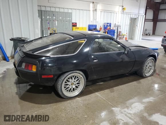 ✅ 1982 Porsche 928 • VIN: WP0JA0921CS820697 • Lot: 67813305. Listed on Copart with 49,946 mi. Free auction sales archive from the USA and detailed vehicle history report at DreamBid. Image 3.