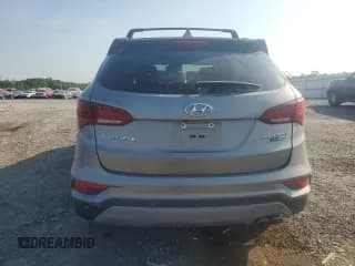 ✅ 2018 Hyundai Santa Fe Ultimate • VIN: 5XYZWDLA9JG549712 • Лот: 59493104. Опубликован ранее на Copart с пробегом 58 747 миль. Бесплатный доступ к архиву аукционных продаж из США и подробный отчёт об истории автомобиля на DreamBid. Изображение 6.