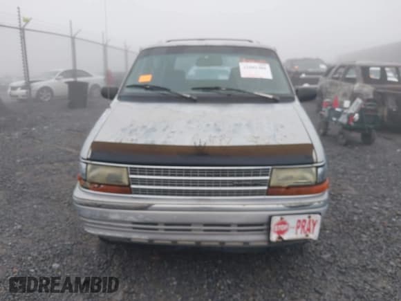✅ 1992 Plymouth Voyager • VIN: 2P4GH2537NR728610 • Lot: 42882486. Listed on IAAI with 164,488 mi. Free auction sales archive from the USA and detailed vehicle history report at DreamBid. Image 13.