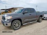 ✅ 2015 Toyota Tundra SR • VIN: 5TFRM5F15FX094689 • Lot: 65120135. Listed on Copart with 115,542 mi. Free auction sales archive from the USA and detailed vehicle history report at DreamBid. Image 1.