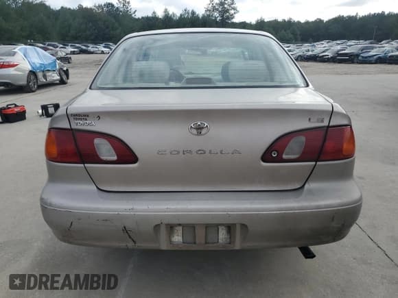 ✅ 1999 Toyota Corolla LE • VIN: 1NXBR12E6XZ148570 • Лот: 81554415. Опубликован ранее на Copart с пробегом 264 960 миль. Бесплатный доступ к архиву аукционных продаж из США и подробный отчёт об истории автомобиля на DreamBid. Изображение 6.