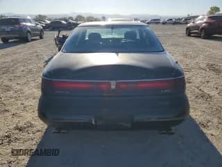 ✅ 1995 Lincoln Mark VIII • VIN: 1LNLM91V4SY760187 • Lot: 69410265. Listed on Copart with 191,025 mi. Free auction sales archive from the USA and detailed vehicle history report at DreamBid. Image 6.