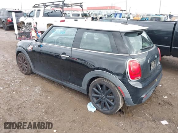 ✅ 2014 MINI Hardtop S • VIN: WMWXM7C51ET987469 • Lot: 43581447. Listed on IAAI with 142,143 mi. Free auction sales archive from the USA and detailed vehicle history report at DreamBid. Image 3.
