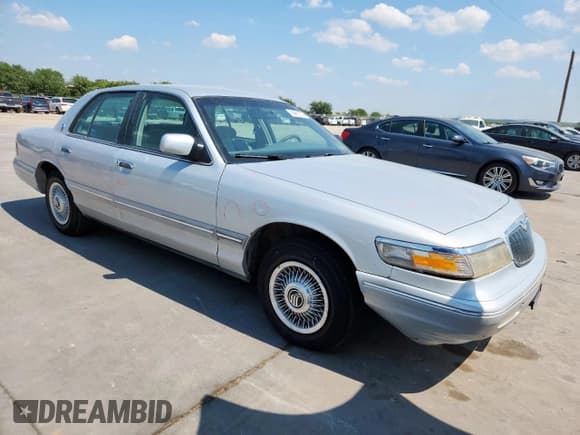 ✅ 1996 Mercury Grand Marquis GS • VIN: 2MELM74W9TX648871 • Lot: 80891275. Wystawiony na Copart z przebiegiem 88 951 mil. Bezpłatny archiwum sprzedaży aukcyjnych z USA i szczegółowy raport historii pojazdu na DreamBid. Zdjęcie 4.