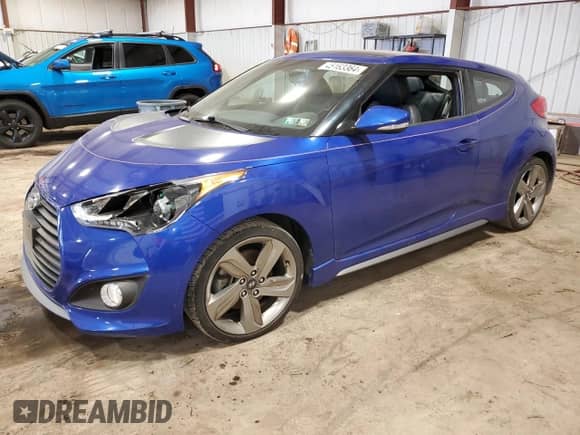 2015 Hyundai Veloster Turbo z VIN KMHTC6AE0FU217191, wystawiony jako Copart lot #45163364 z przebiegiem 39 253 mil mil oraz . Historia ofert i sprzedaży dostępna na DreamBid. Obrazek 1.