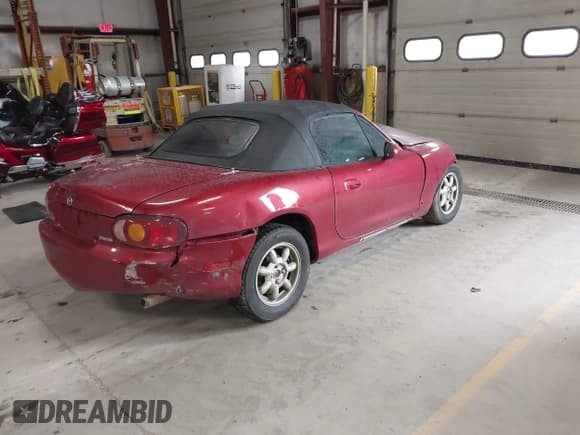 ✅ 2001 Mazda MX-5 Miata • VIN: JM1NB353X10215794 • Lot: 42092359. Listed on IAAI with 121,684 mi. Free auction sales archive from the USA and detailed vehicle history report at DreamBid. Image 4.
