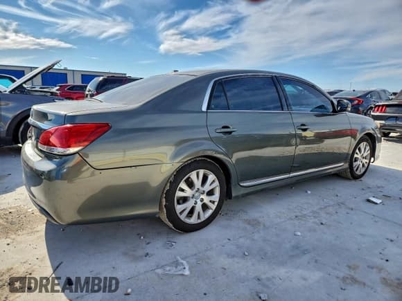 ✅ 2011 Toyota Avalon Limited • VIN: 4T1BK3DB2BU376013 • Lot: 95025885. Listed on Copart with 214,946 mi. Free auction sales archive from the USA and detailed vehicle history report at DreamBid. Image 3.