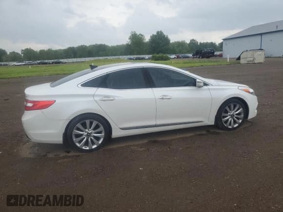 ✅ 2014 Hyundai Azera Limited • VIN: KMHFH4JG3EA379188 • Лот: 62874875. Опубликован ранее на Copart с пробегом 169 645 миль. Бесплатный доступ к архиву аукционных продаж из США и подробный отчёт об истории автомобиля на DreamBid. Изображение 3.