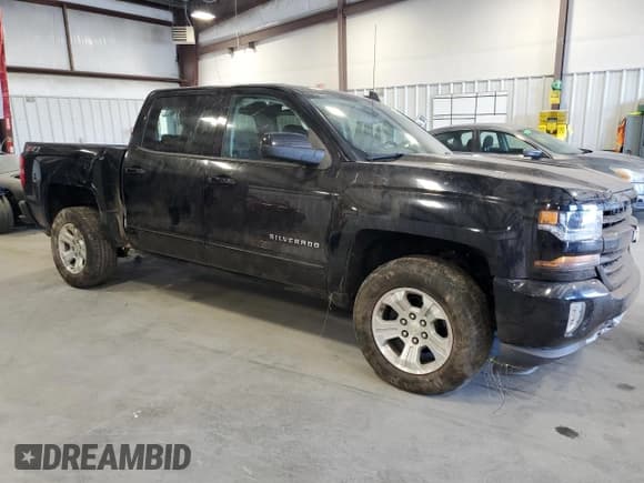 ✅ 2018 Chevrolet Silverado 1500 LT • VIN: 3GCUKREC2JG456291 • Лот: 60187564. Опубликован ранее на Copart с пробегом 93 977 миль. Бесплатный доступ к архиву аукционных продаж из США и подробный отчёт об истории автомобиля на DreamBid. Изображение 4.
