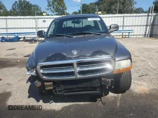 ✅ 2003 Dodge Dakota Sport • VIN: 1D7HL38N43S184708 • Lot: 73320964. Wystawiony na Copart z przebiegiem 143 398 mil. Bezpłatny archiwum sprzedaży aukcyjnych z USA i szczegółowy raport historii pojazdu na DreamBid. Zdjęcie 5.