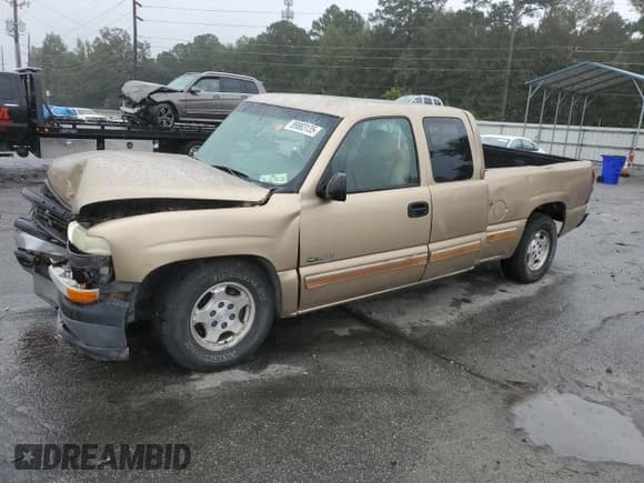 ✅ 2000 Chevrolet Silverado 1500 LS • VIN: 2GCEC19T1Y1385603 • Лот: 89883135. Опубликован ранее на Copart с пробегом 444 744 миль. Бесплатный доступ к архиву аукционных продаж из США и подробный отчёт об истории автомобиля на DreamBid. Изображение 1.