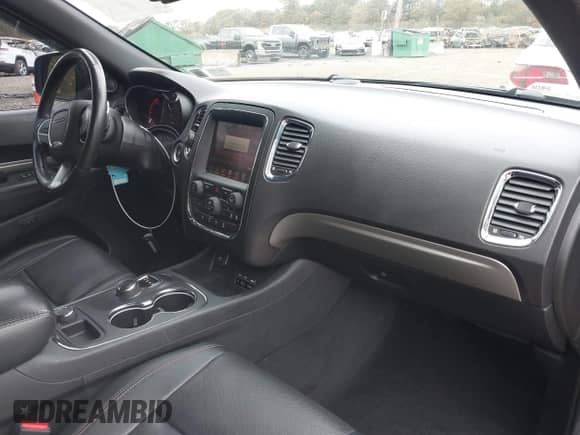 2014 Dodge Durango R/T with VIN 1C4SDJCT8EC543336, listed as a IAAI auction lot 43558331 with 125,808 mi miles and . Bid and sale history available at DreamBid. Image 5.