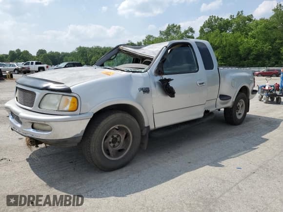 ✅ 1998 Ford F-150 XL • VIN: 2FTRX08L1WCA81688 • Lot: 58185525. Listed on Copart with 185,062 mi. Free auction sales archive from the USA and detailed vehicle history report at DreamBid. Image 1.