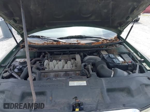 ✅ 1998 Lincoln Continental • VIN: 1LNFM97V6WY671313 • Lot: 42304977. Wystawiony na IAAI z przebiegiem 204 876 mil. Bezpłatny archiwum sprzedaży aukcyjnych z USA i szczegółowy raport historii pojazdu na DreamBid. Zdjęcie 10.