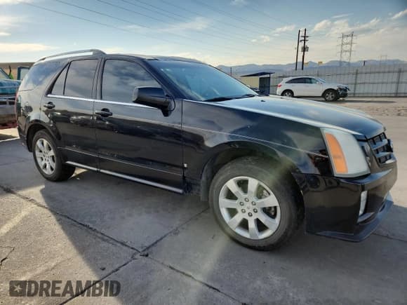 ✅ 2009 Cadillac SRX AWD • VIN: 1GYEE437390104416 • Lot: 90649745. Listed on Copart with 152,982 mi. Free auction sales archive from the USA and detailed vehicle history report at DreamBid. Image 4.