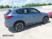✅ 2016 Mazda CX-5 Grand Touring • VIN: JM3KE2DY5G0701530 • Лот: 42553376. Опубликован ранее на IAAI с пробегом 102 920 миль. Бесплатный доступ к архиву аукционных продаж из США и подробный отчёт об истории автомобиля на DreamBid. Изображение 4.