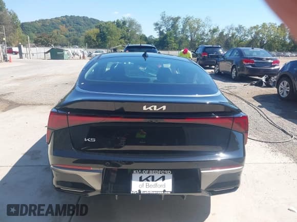 ✅ 2026 Kia K5 LXS • VIN: KNAG24J79T5400803 • Lot: 43196842. Listed on IAAI with 146 mi. Free auction sales archive from the USA and detailed vehicle history report at DreamBid. Image 17.