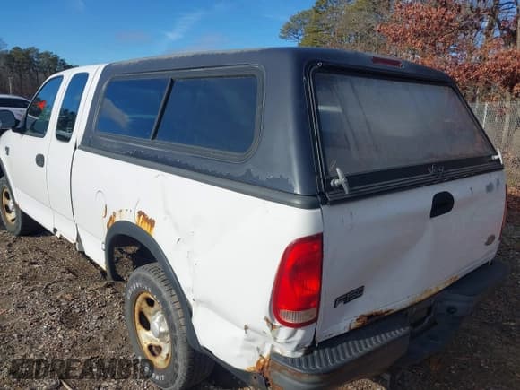 ✅ 2003 Ford F-150 XL • VIN: 2FTRX18W43CA62452 • Lot: 41497879. Listed on IAAI with 125,828 mi. Free auction sales archive from the USA and detailed vehicle history report at DreamBid. Image 3.