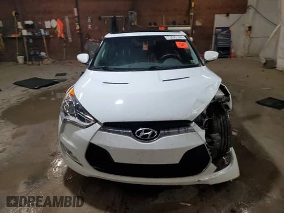 2012 Hyundai Veloster w/Red Int z VIN KMHTC6AD7CU030162, wystawiony jako Copart lot #73692164 z przebiegiem 101 371 mil mil oraz Szkoda całkowita • Salvage title. Historia ofert i sprzedaży dostępna na DreamBid. Obrazek 5.