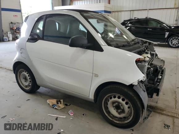 ✅ 2016 Smart fortwo Passion • VIN: WMEFJ5DA2GK139148 • Lot: 70122315. Wystawiony na Copart z przebiegiem 59 684 mil. Bezpłatny archiwum sprzedaży aukcyjnych z USA i szczegółowy raport historii pojazdu na DreamBid. Zdjęcie 4.