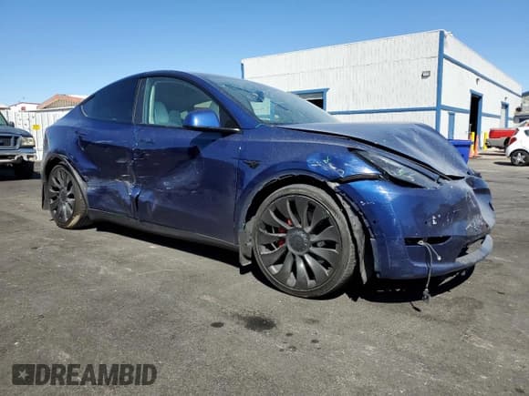 ✅ 2022 Tesla Model Y Performance • VIN: 7SAYGDEF8NF406574 • Lot: 80165595. Listed on Copart with 83,261 mi. Free auction sales archive from the USA and detailed vehicle history report at DreamBid. Image 4.