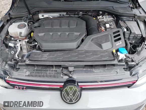 ✅ 2023 Volkswagen Golf GTI SE • VIN: WVW2A7CD0PW117839 • Лот: 42523359. Опубликован ранее на IAAI с пробегом 27 908 миль. Бесплатный доступ к архиву аукционных продаж из США и подробный отчёт об истории автомобиля на DreamBid. Изображение 10.