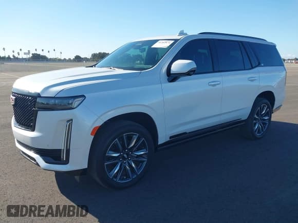 ✅ 2023 Cadillac Escalade 4WD Sport • VIN: 1GYS4FKL7PR286940 • Лот: 40702874. Опубликован ранее на IAAI с пробегом 7 981 миль. Бесплатный доступ к архиву аукционных продаж из США и подробный отчёт об истории автомобиля на DreamBid. Изображение 2.