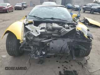 2006 Chevrolet Corvette with VIN 1G1YY26U165123036, listed as a Copart auction lot 82493634 with 112,367 mi miles and Salvage title. Bid and sale history available at DreamBid. Image 5.