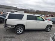 ✅ 2015 Chevrolet Suburban LTZ • VIN: 1GNSKKKC7FR290156 • Lot: 43777007. Listed on IAAI with 145,354 mi. Free auction sales archive from the USA and detailed vehicle history report at DreamBid. Image 14.
