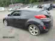 2013 Hyundai Veloster w/Gray Int z VIN KMHTC6AD5DU162385, wystawiony jako Copart lot #71346754 z przebiegiem 86 922 mil mil oraz Szkoda całkowita • Salvage title. Historia ofert i sprzedaży dostępna na DreamBid. Obrazek 2.