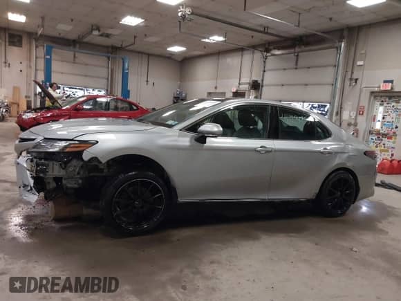 2021 Toyota Camry XSE with VIN 4T1K61BK4MU030236, listed as a IAAI auction lot 41723055 with 117,435 mi miles and . Bid and sale history available at DreamBid. Image 14.