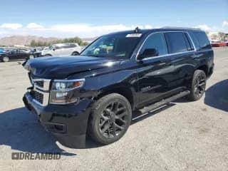 2020 Chevrolet Tahoe LS with VIN 1GNSCAKC1LR189763, listed as a Copart auction lot 71305905 with 68,205 mi miles and Salvage title. Bid and sale history available at DreamBid. Image 1.