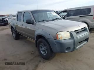 ✅ 2003 Nissan Frontier SE • VIN: 1N6ED27T03C452410 • Lot: 43587217. Listed on IAAI with 338,103 mi. Free auction sales archive from the USA and detailed vehicle history report at DreamBid. Image 1.