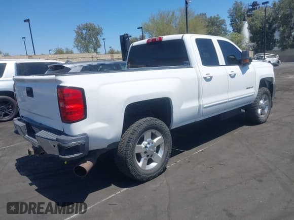 ✅ 2015 Chevrolet Silverado 2500HD LT • VIN: 1GC2CVE87FZ500852 • Lot: 43023197. Listed on IAAI with 214,790 mi. Free auction sales archive from the USA and detailed vehicle history report at DreamBid. Image 4.